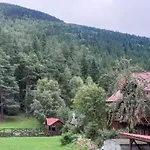за рікою Апартаменты